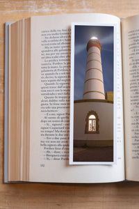 Alone in the Dark fine art bookmark resting in an open book, close-up