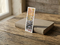 Autumn at Dardagna fine art bookmark resting on a linen-bound book in soft window light