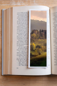 Autumn Hills fine art bookmark resting in an open book, close-up