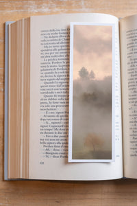 Autumn Solitude fine art bookmark resting in an open book, close-up