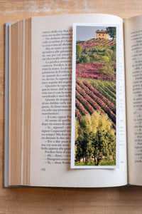 Autumn Vineyards fine art bookmark resting in an open book, close-up