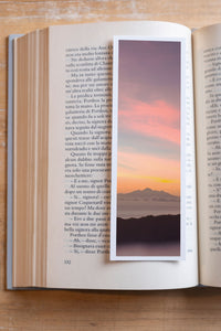 Bali Sunset fine art bookmark resting in an open book, close-up