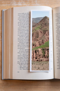 Burnt Mountain fine art bookmark resting in an open book, close-up