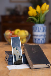 Chapel Light fine art bookmark styled with a dark book and fresh fruit