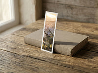 Chefchaouen fine art bookmark resting on a linen-bound book in soft window light