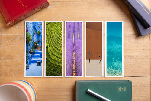 Colors of the World fine art bookmark set displayed with vintage books