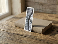 Eagles Viewpoint fine art bookmark resting on a linen-bound book in soft window light
