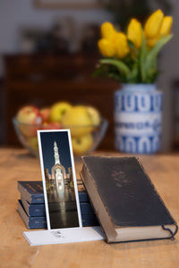 Enlightened Minaret fine art bookmark styled with a dark book and fresh fruit