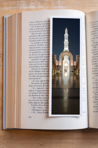 Enlightened Minaret fine art bookmark resting in an open book, close-up