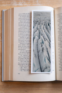 Frozen Veins fine art bookmark resting in an open book, close-up