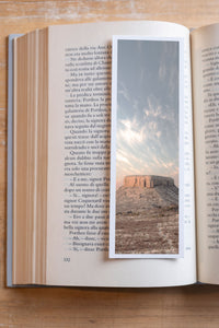Lonely Mesa fine art bookmark resting in an open book, close-up