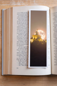 Moonlight Dance fine art bookmark resting in an open book, close-up