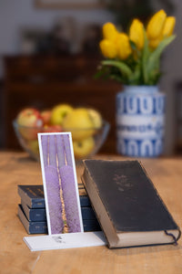 Purple Fields fine art bookmark styled with a dark book and fresh fruit