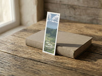 Rice Terraces fine art bookmark resting on a linen-bound book in soft window light