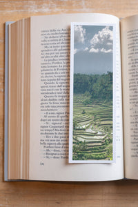 Rice Terraces fine art bookmark resting in an open book, close-up