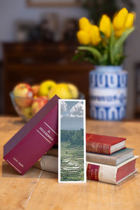 Rice Terraces fine art bookmark beside a stack of vintage books