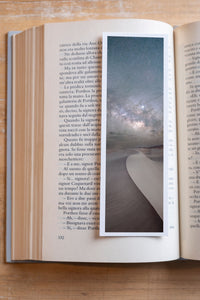 Sahara Milky Way fine art bookmark resting in an open book, close-up