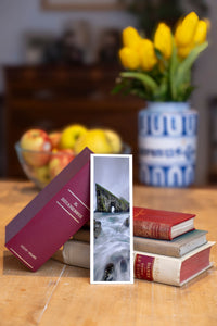 Sea Gate fine art bookmark beside a stack of vintage books