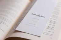 Reverse side of the Shimmering Sunset fine art bookmark with title and catalogue details