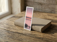 Soft Evening fine art bookmark resting on a linen-bound book in soft window light