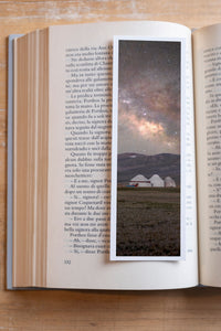 Starry Camp fine art bookmark resting in an open book, close-up