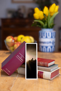 Summer Haze fine art bookmark beside a stack of vintage books