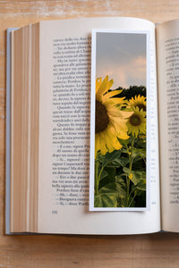 Summer Sunflowers fine art bookmark resting in an open book, close-up