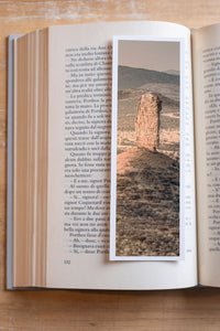 Vingerklip fine art bookmark resting in an open book, close-up