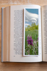 Wild Orchid fine art bookmark resting in an open book, close-up