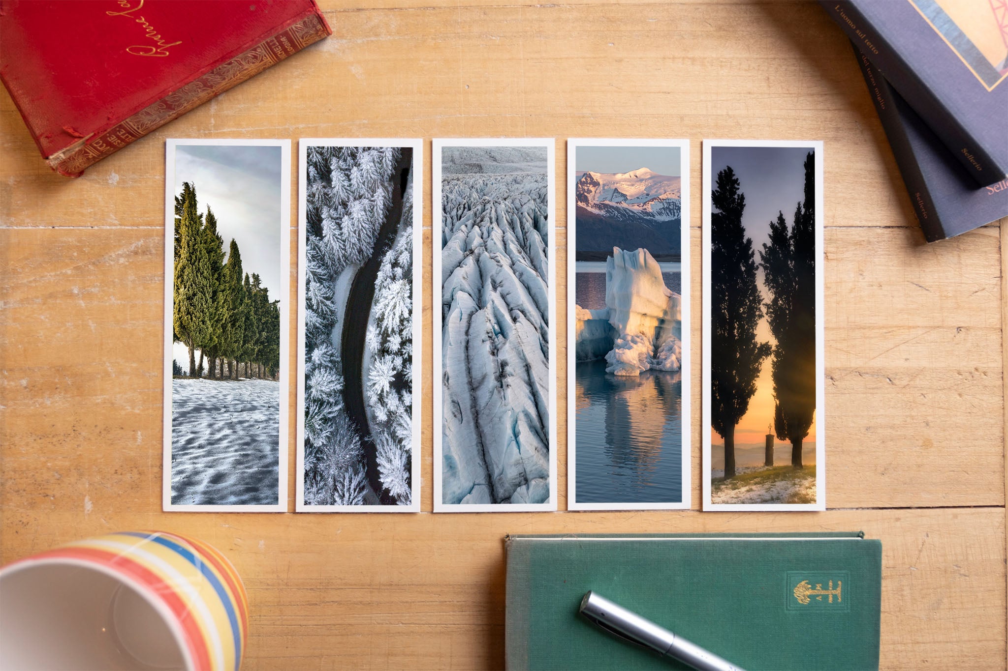 Winter fine art bookmark set displayed with vintage books