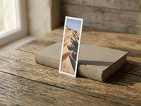 Zigzag Ridge fine art bookmark resting on a linen-bound book in soft window light