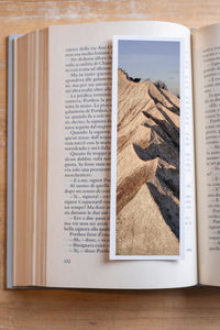 Zigzag Ridge fine art bookmark resting in an open book, close-up