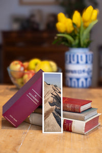 Zigzag Ridge fine art bookmark beside a stack of vintage books